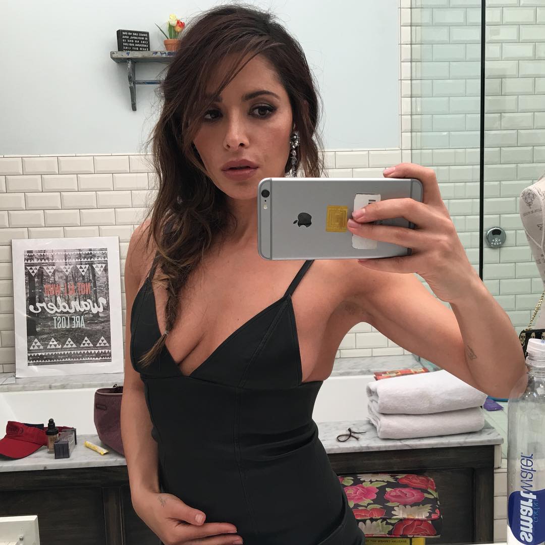 Sarah Shahi taking a selfie