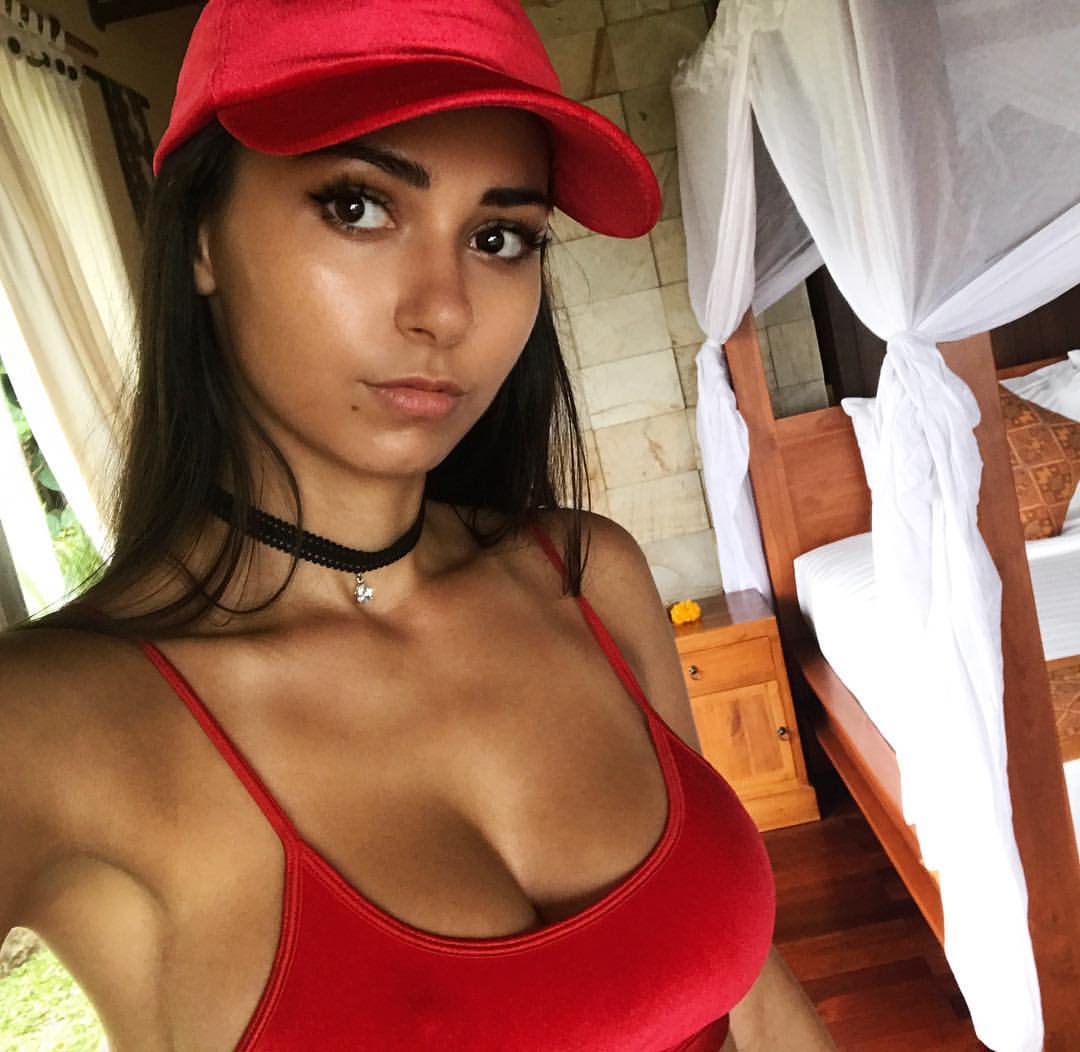 Helga Lovekaty in a bikini taking a selfie