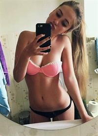Anonymous in lingerie taking a selfie