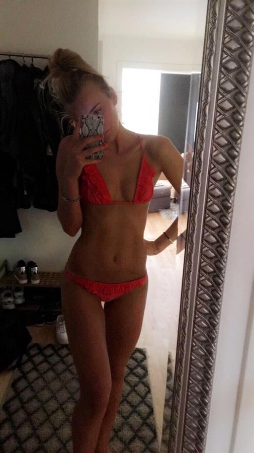 Anonymous in a bikini taking a selfie