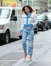 Bella Thorne braless tits seen by paparazzi showing her pierced nipple dressed all in Chanel.






