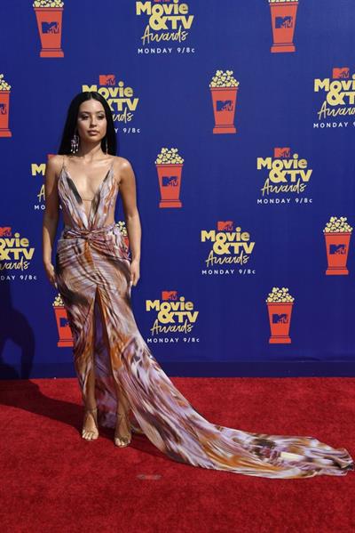 Alexa Demie braless boobs in a revealing dress on the red carpet at the 2019 MTV Movie and TV Awards.






















