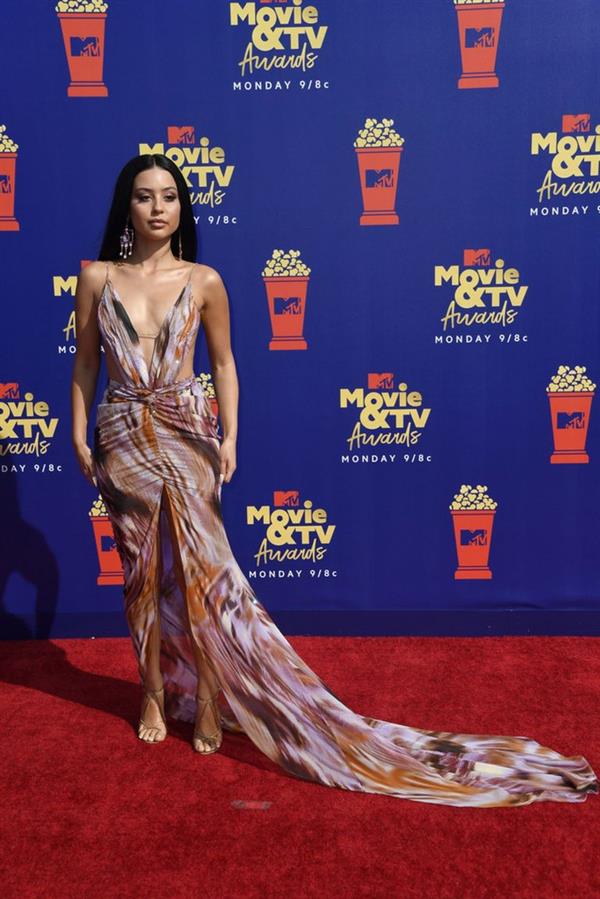 Alexa Demie braless boobs in a revealing dress on the red carpet at the 2019 MTV Movie and TV Awards.






















