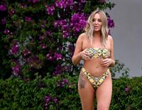 Charlotte Crosby in a sexy bikini seen by paparazzi.




























