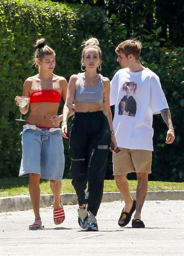 Hailey Baldwin Bieber in a sexy red bikini out with Justin Bieber seen by paparazzi.




