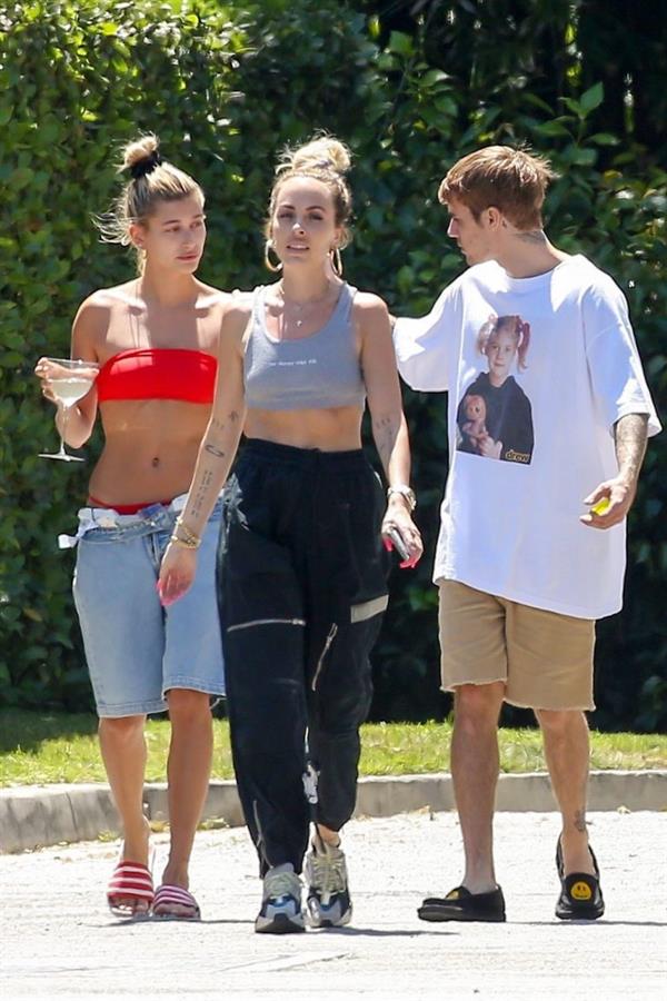 Hailey Baldwin Bieber in a sexy red bikini out with Justin Bieber seen by paparazzi.




