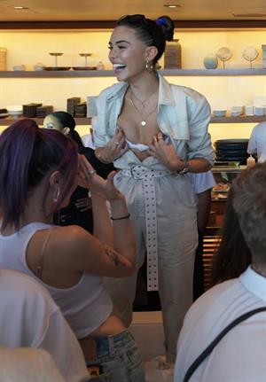 Madison Beer showing off her boobs in a sexy revealing top seen by paparazzi.




