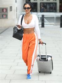 Maya Jama sexy in a crop top showing some nice cleavage seen by paparazzi.










