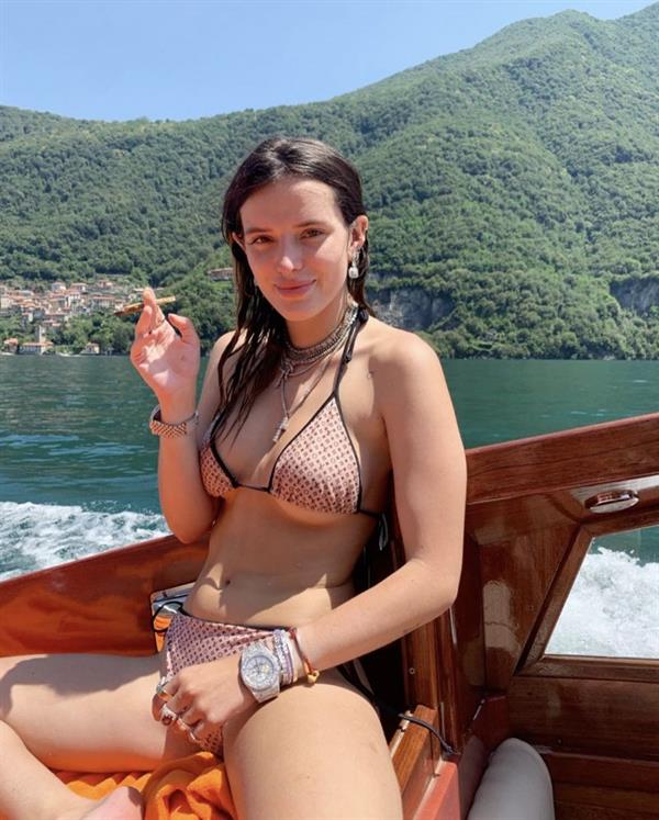 Bella Thorne sexy and high in a bikini smoking weed.












