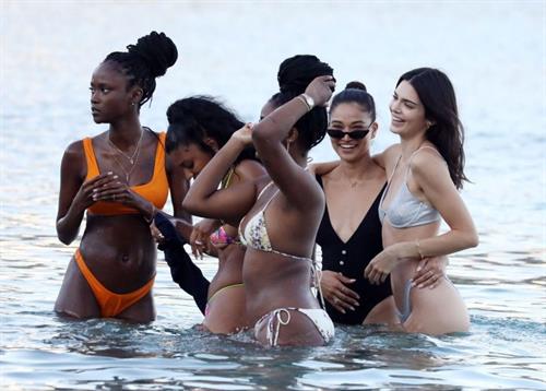 Kendall Jenner sexy ass in a thong bikini seen by paparazzi in the water at the beach.




























