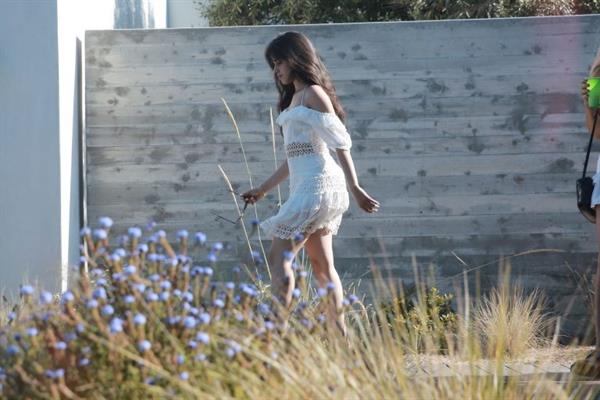 Camila Cabello sexy ass in a white dress seen with Shawn Mendes by paparazzi.


