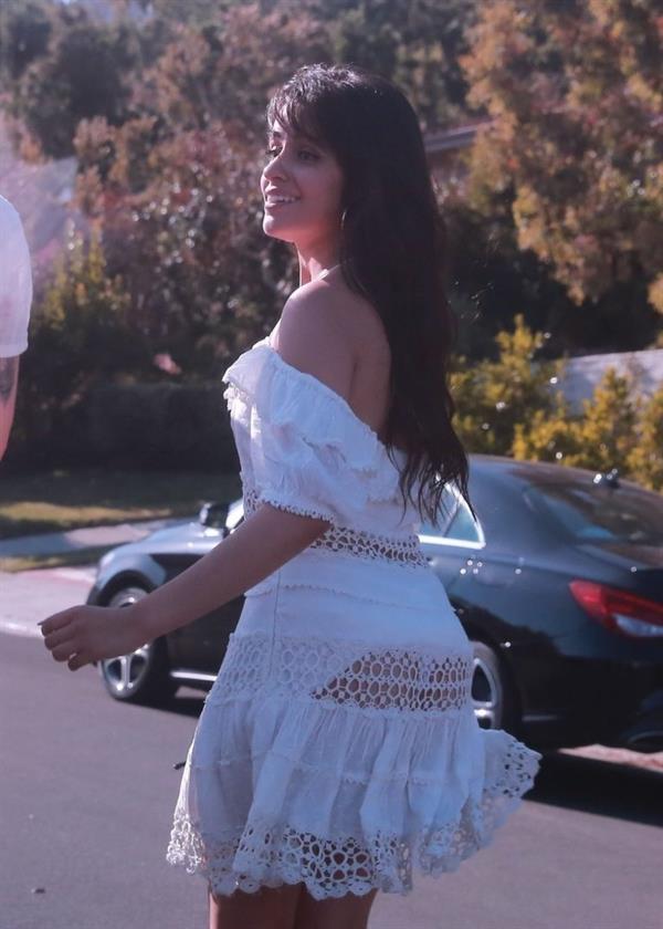 Camila Cabello sexy ass in a white dress seen with Shawn Mendes by paparazzi.


