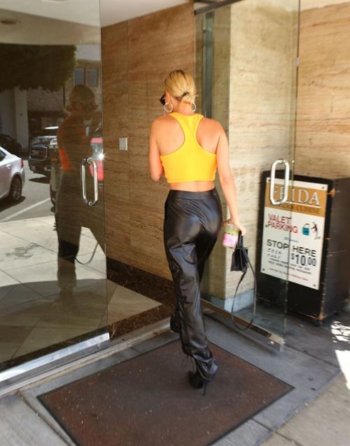 Hailey Bieber braless tits pokies seen by paparazzi in a halter top.





