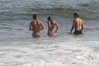 Nina Agdal Bikini Pictures Nina Agdal sexy ass in a thong bikini at the beach with her boyfriend seen by paparazzi.