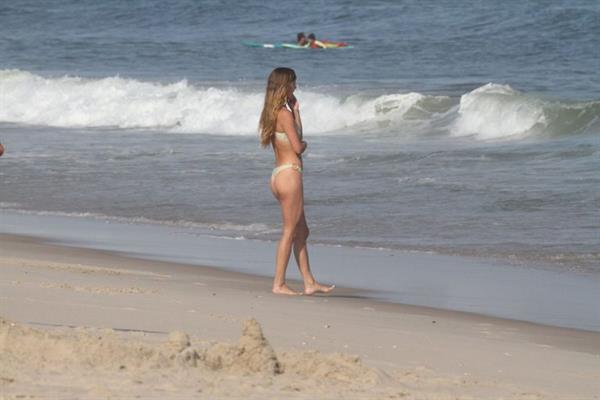 Nina Agdal sexy ass in a thong bikini at the beach with her boyfriend seen by paparazzi.











