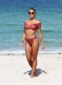 Elisa De Panicis sexy tits pokies and ass in a thong bikini seen by paparazzi.




