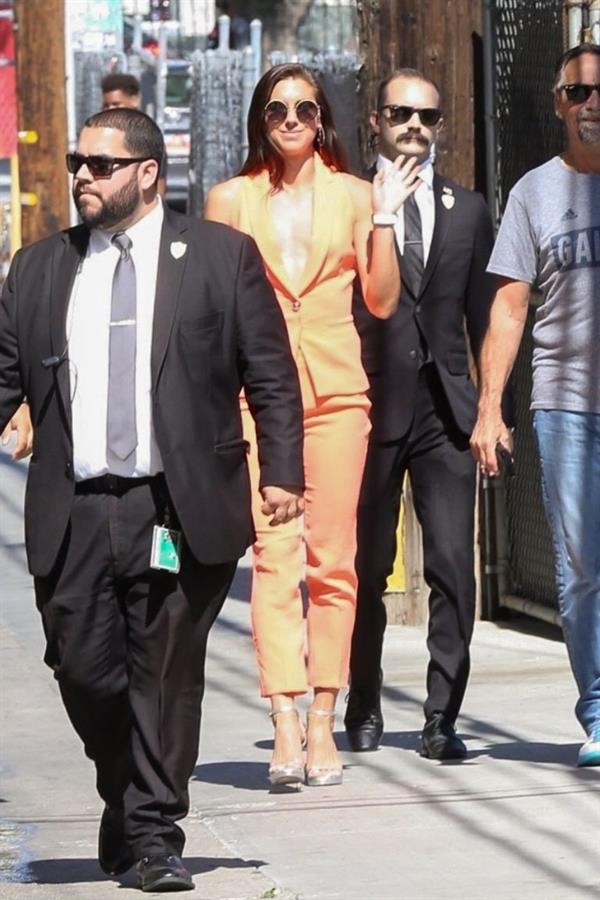 Alex Morgan braless and sexy in a orange jacket seen by paparazzi.








