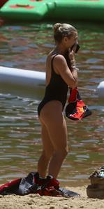 Elsa Pataky sexy ass and cleavage in a swimsuit seen by paparazzi with Chris Hemsworth.














