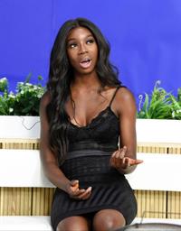Yewande Biala from Love Island sexy in a tight black dress on  I Saw It First HQ .















