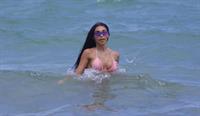 Chantel Jeffries sexy ass in a bikini at the beach in Miami seen by paparazzi showing nice cleavage.























