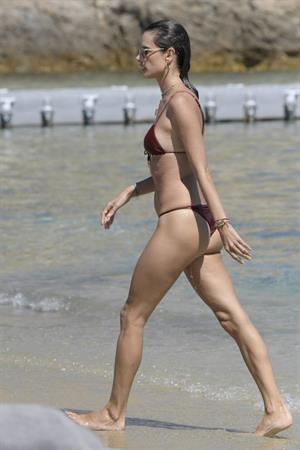 Alessandra Ambrosio topless and sexy at the beach in a thong bikini showing off her perfect model ass and boobs.
































