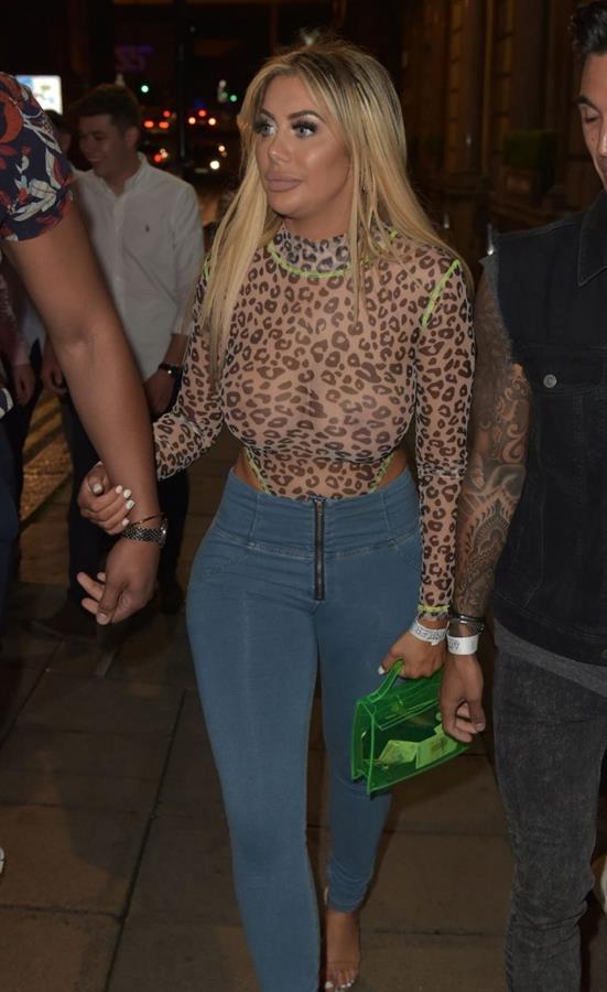 Chloe Ferry braless boobs in a see through top seen by paparazzi showing off her tits and ass.





