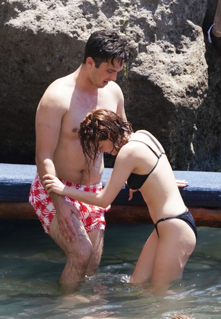 Zoey Deutch sexy boobs and ass in a little bikini in the water seen by paparazzi.



















