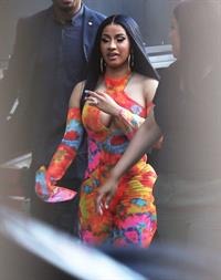 Cardi B boobs and booty on display on and off stage showing nice cleavage and her sexy ass in a tight dress.























