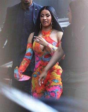 Cardi B boobs and booty on display on and off stage showing nice cleavage and her sexy ass in a tight dress.























