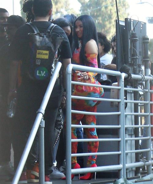Cardi B Pictures Cardi B boobs and booty on display on and off stage showing nice cleavage and her sexy ass in a tight dress.