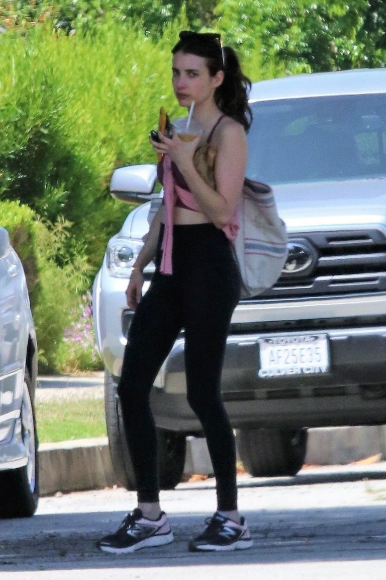 Emma Roberts Pictures Emma Roberts sexy little ass and thigh gap in tight pants seen by paparazzi with Garrett Hedlund.