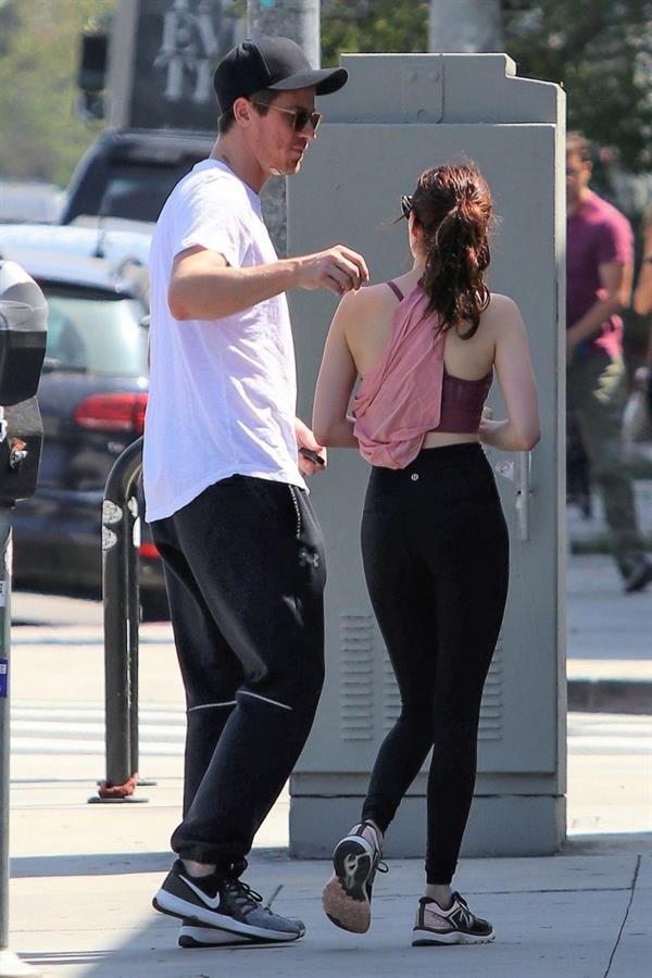 Emma Roberts sexy little ass and thigh gap in tight pants seen by paparazzi with Garrett Hedlund.



