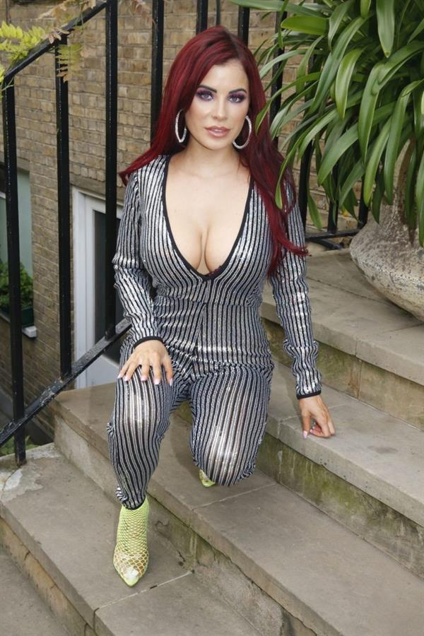 Carla Howe braless boobs showing nice cleavage in London.




