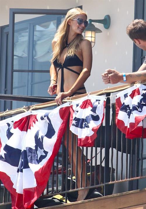 Paris Hilton on a balcony