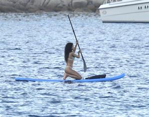 Rihanna paddle boarding