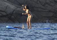 Rihanna paddle boarding