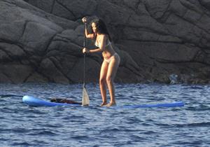 Rihanna paddle boarding