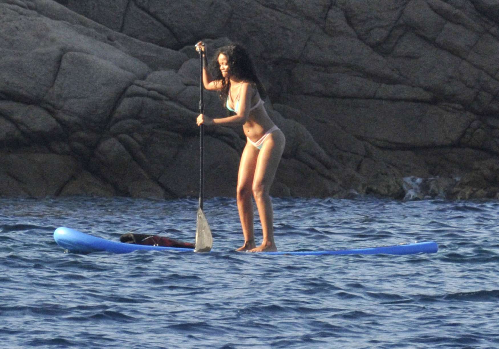 Rihanna paddle boarding
