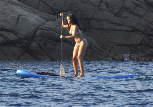 Rihanna paddle boarding