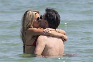 Sylvie Meis sexy ass in a bikini at the beach with her new boyfriend at the beach seen by paparazzi.















