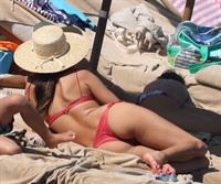 Alessandra Ambrosio perfect model body in a sexy little thong bikini seen at the beach by paparazzi showing nice cleavage and ass.





















