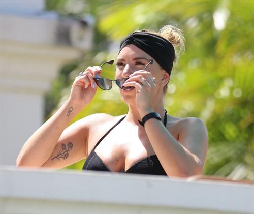 Olivia Buckland Bikini Pictures Olivia Buckland sexy ass in a bikini seen by paparazzi with Alex Bowen.