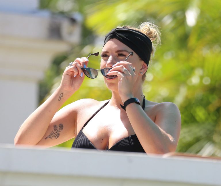 Olivia Buckland Bikini Pictures Olivia Buckland sexy ass in a bikini seen by paparazzi with Alex Bowen.