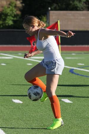 Kendra Wilkinson braless boobs showing her tits pokies seen by paparazzi playing soccer seen by paparazzi.












