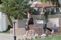 Ariel Winter paparazzi pictures in black bikini top and short skirt