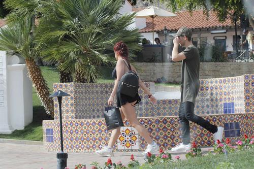 Ariel Winter paparazzi pictures in black bikini top and short skirt