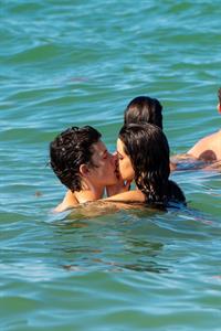Camila Cabello and Shawn Mendes making out in the water seen by paparazzi kissing.





































