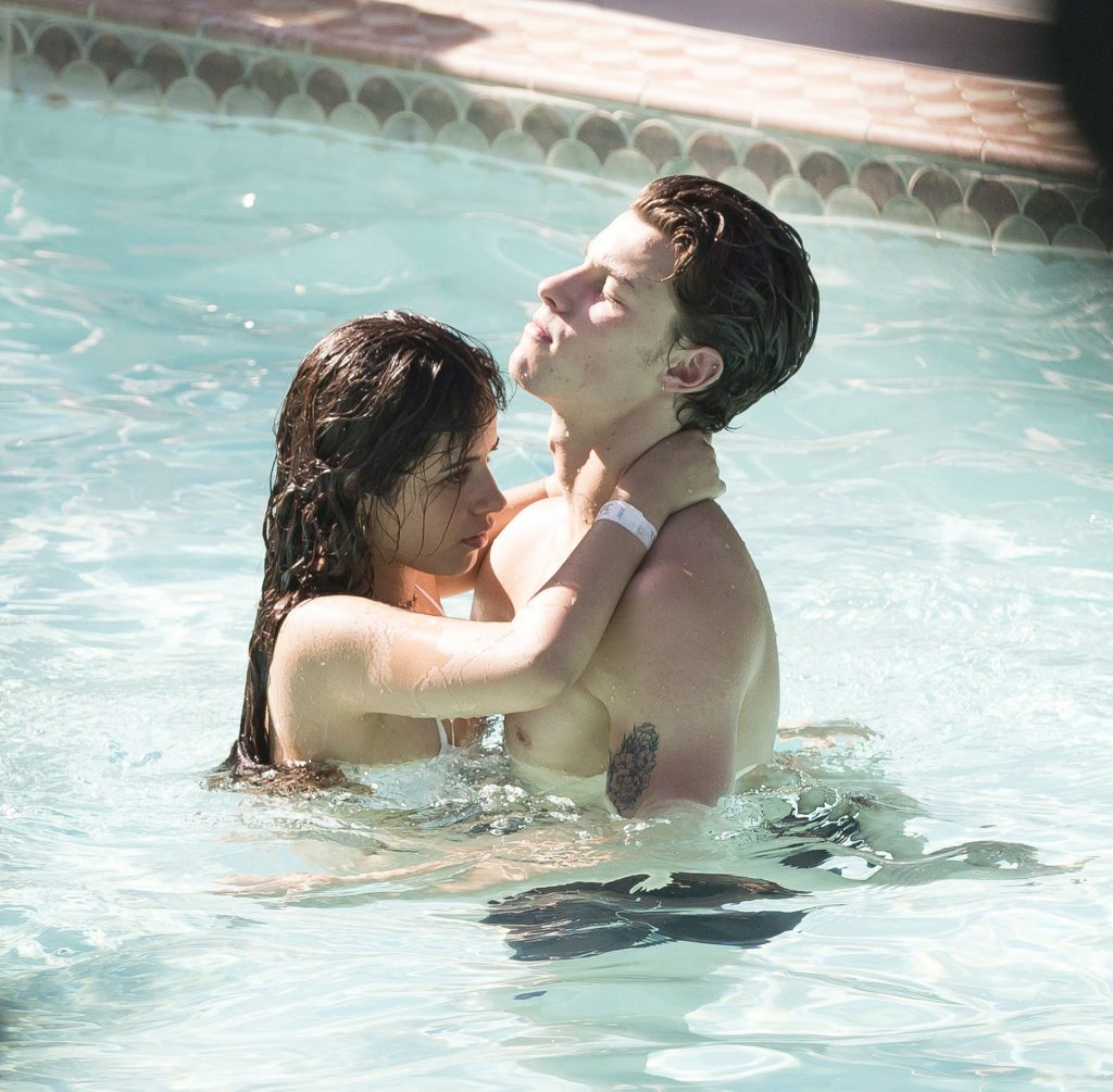 Camila Cabello Pictures Camila Cabello and Shawn Mendes making out in the water seen kissing by paparazzi.