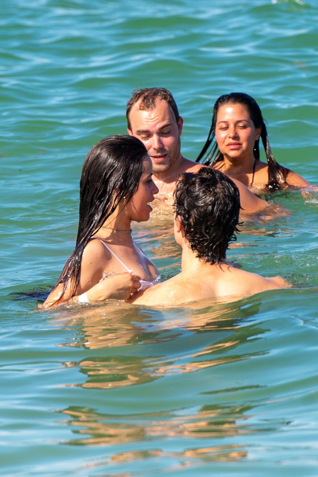 Camila Cabello Bikini Pictures Camila Cabello and Shawn Mendes making out in the water seen by paparazzi kissing.