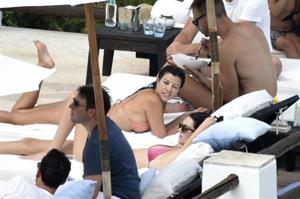 Kendall Jenner with Kourtney Kardashian sexy asses in thong bikinis seen by paparazzi.

